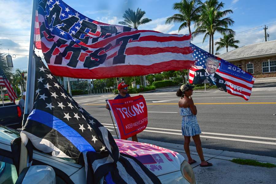 Trump supporters gather around Mar-A-Lago, after Republican presidential nominee and former U.S. President Donald Trump returned from Trump International Golf Club, which was the site of a shooting, to his residence at Mar-A-Lago in Palm Beach, Florida
