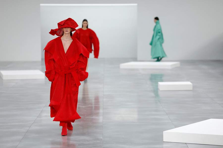 Models present creations by designer Satoshi Kondo as part of his Fall/Winter 2025-2026 Women's ready-to-wear collection show for fashion house Issey Miyake during Paris Fashion Week in Paris