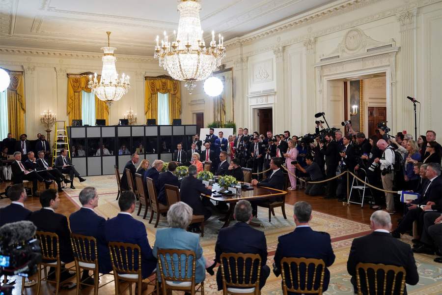 U.S. President Donald Trump meets Ukrainian President Volodymyr Zelenskiy, German Chancellor Friedrich Merz, French President Emmanuel Macron, British Prime Minister Keir Starmer, Italian Prime Minister Giorgia Meloni, Finland's President Alexander Stubb, NATO Secretary General Mark Rutte and European Commission President Ursula von der Leyen amid negotiations to end the Russian war in Ukraine, at the White House in Washington, D.C., U.S., August 18, 2025