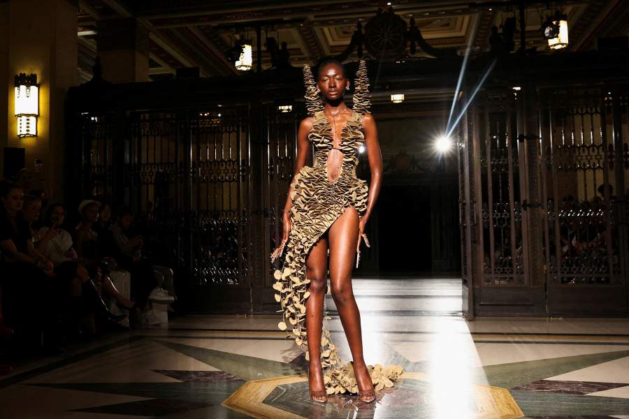 A model presents a creation at the Karina Bond SS26 catwalk show 'The Midnight Sun' as part of London Fashion Week in London, Britain, September 19, 2025