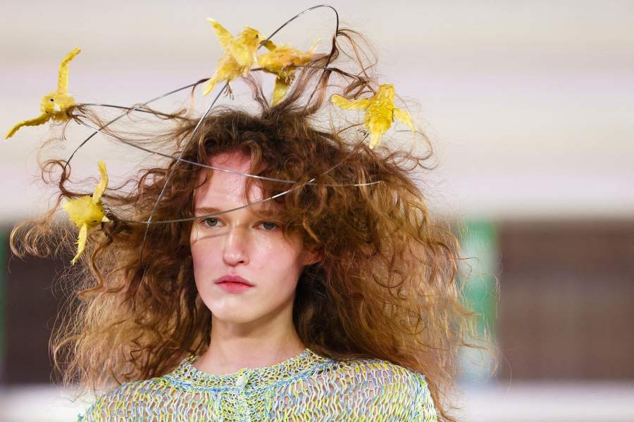 A model presents a creation from the Moschino Spring/Summer 2026 show during Fashion Week in Milan, 