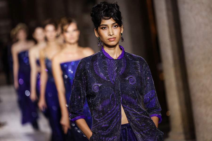 Models present creations from the Giorgio Armani Spring/Summer 2026 collection during Fashion Week in Milan, Italy, September 28, 2025.