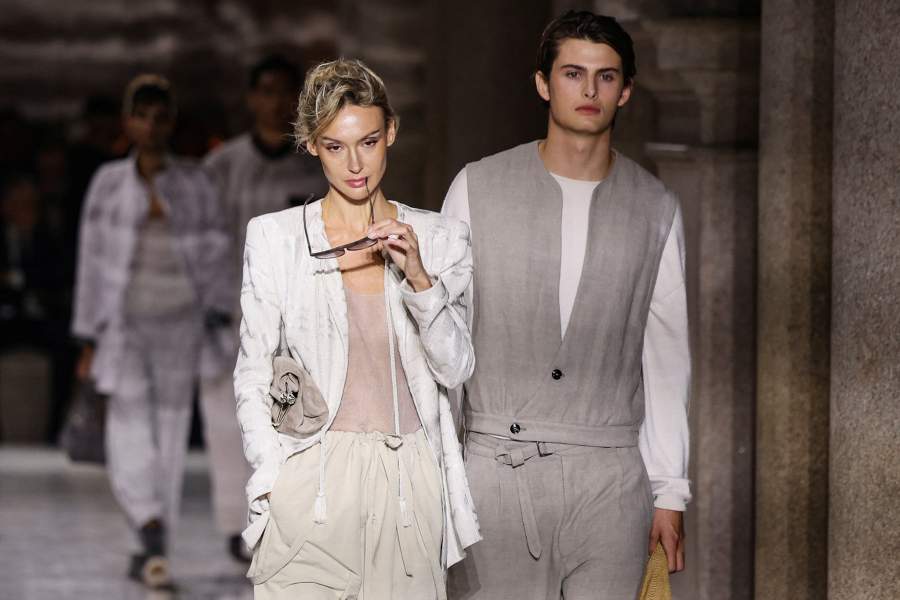 Models present creations from the Giorgio Armani Spring/Summer 2026 collection during Fashion Week in Milan, Italy, September 28, 2025. 