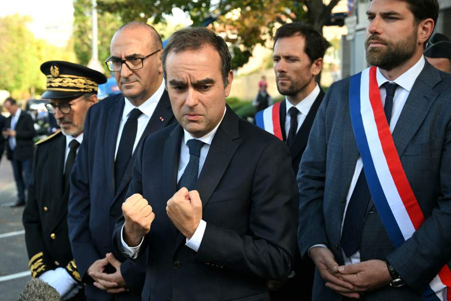 France's Prime Minister Sebastien Lecornu, flanked by Droite Republicaine's MP Vincent Jeanbrun, Ensemble Pour la Republique's MP Mathieu Lefevre, Paris Police Prefect Laurent Nunez and Val-de-Marne prefect Etienne Stoskopf, speaks to journalists after a visit to a police station in L'Hay-les-Roses, on the southern outskirts of Paris, France, October 11, 2025. 