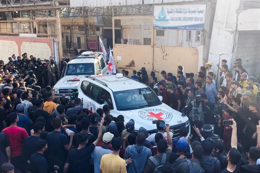  Red Cross vehicle transports hostages, held in Gaza since the deadly October 7, 2023 attack, following their handover as part of a ceasefire and hostages-prisoners swap deal between Hamas and Israel, in Gaza City October 13, 2025 in this still image taken from video.