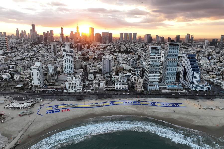 A drone view shows a depiction of U.S. President Donald Trump, on the day Israeli hostages, held in Gaza since the deadly October 7, 2023 attack by Hamas, are expected to be released as part of a U.S.-brokered hostages-prisoners swap and a ceasefire deal in Gaza between Hamas and Israel, near the U.S. Consulate in Tel Aviv, Israel October 13, 2025