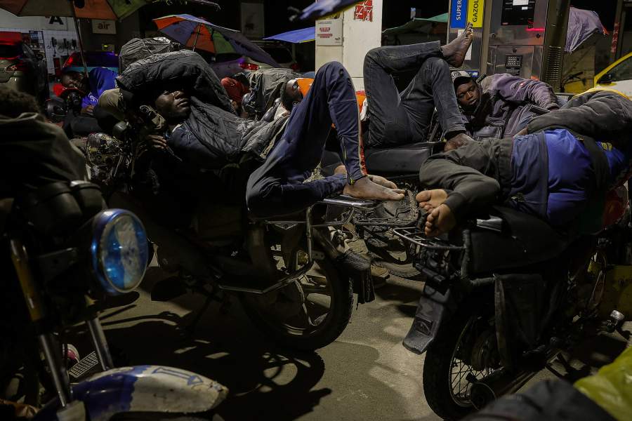 Motorcycle taxi riders, who cannot afford to pay rent, s