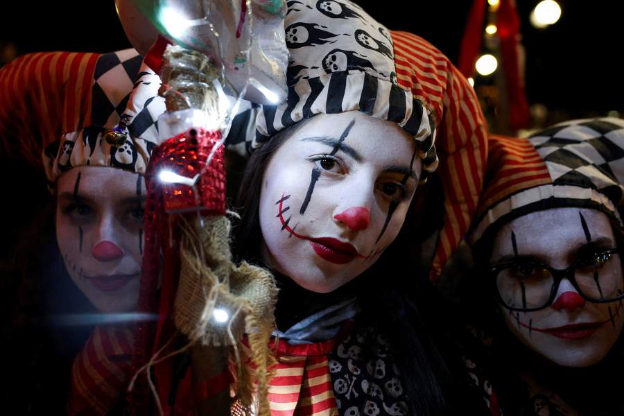 evellers dressed in costumes take part in the annual Halloween Derry carnival parade in Londonderry, Northern Ireland, October 31, 2025