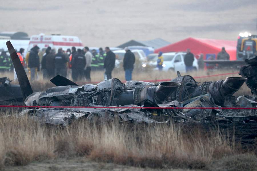 Members of emergency services work at the site of the Turkish C-130 military cargo plane crash near the Azerbaijani border, in Sighnaghi municipality, Georgia, November 12, 2025. REUTERS/Irakli Gedenidze TPX IMAGES OF THE DAY