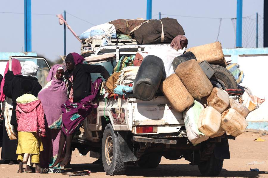 A newly arrived Sudanese refugee from al-Fashir, fleeing ongoing clashes between the paramilitary Rapid Support Forces (RSF) and the Sudanese army, gets off a truck inside the Tine transit camp in eastern Chad, November 23, 2025. REUTERS/Amr Abdallah Dalsh