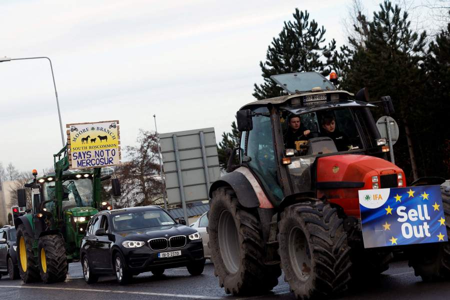 Tractors with signs drive on a road during a farmers' protest against the EU-Mercosur free trade agreement, in Athlone, Ireland, January 10, 2026. REUTERS/Clodagh Kilcoyne TPX IMAGES OF THE DAY
