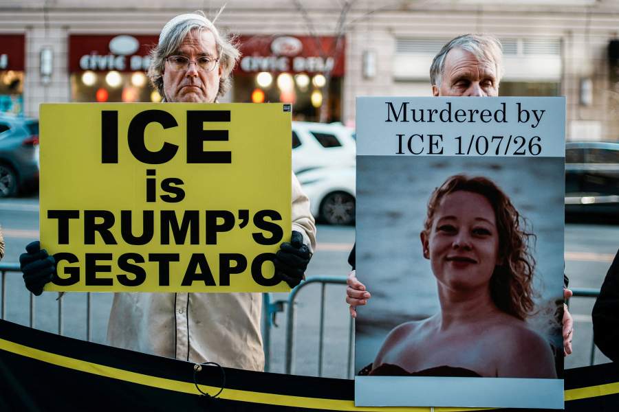 Demonstrators display signs during an anti-U.S. Immigration and Customs Enforcement (ICE) protest, after a U.S. immigration agent shot and killed 37-year-old Renee Nicole Good in her car in Minneapolis, outside of the 26 Federal Plaza building in Lower Manhattan in New York City, U.S., January 8, 2026. REUTERS/Eduardo Munoz