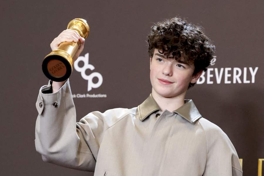 Owen Cooper poses with the Best Performance by a Male Actor in a Supporting Role on Television award for "Adolescence" at the 83rd Annual Golden Globes in Beverly Hills