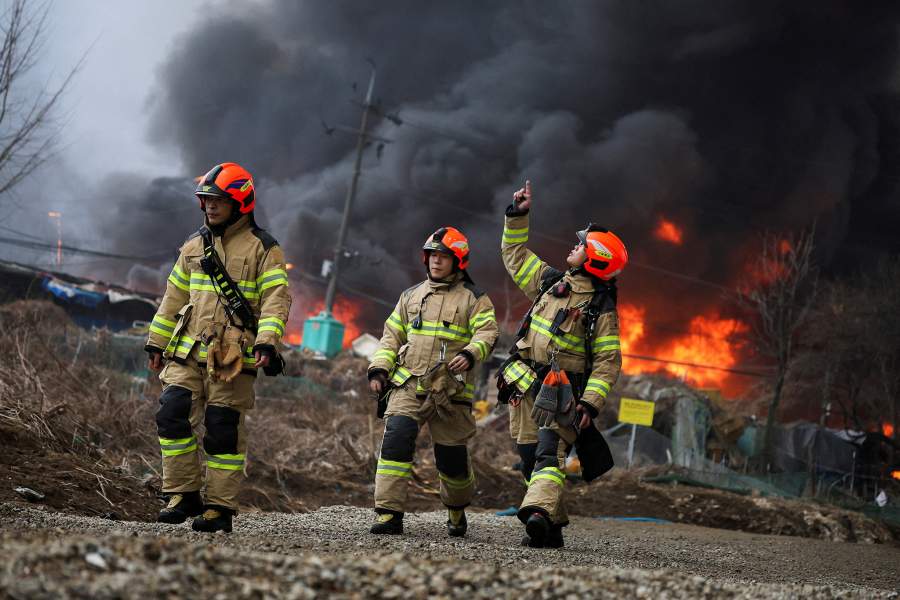 Firefighters at the scene of a fire at Guryong village, the last shantytown in the Gangnam district, in Seoul, South Korea, January 16, 2026