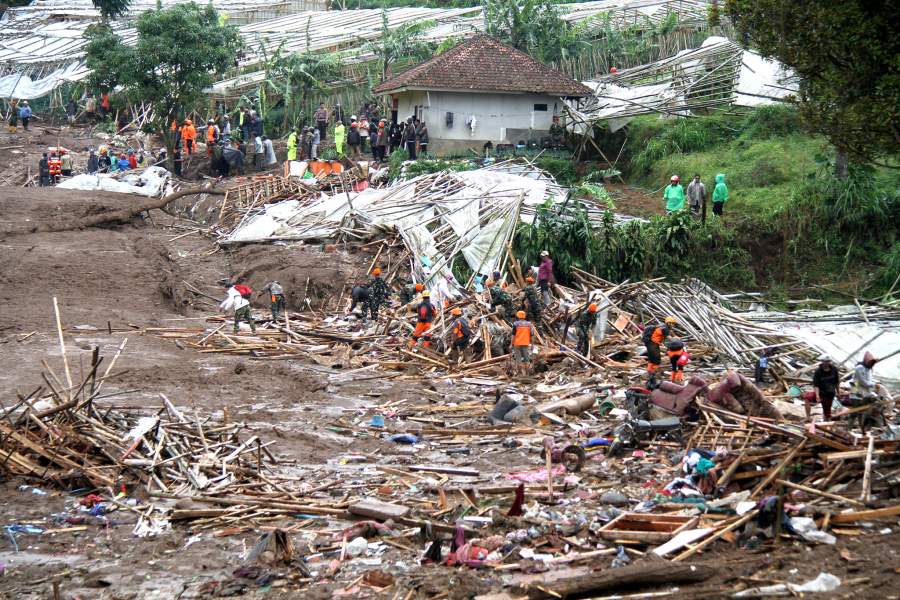 Rescue team members work on site during search operations after a landslide accompanied by flash floods struck Cisarua Sub-district in West Bandung Regency, West Java, Indonesia, Jan. 24, 2026.