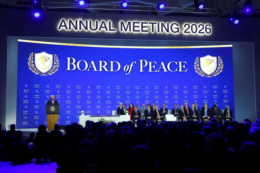 U.S. President Donald Trump takes part in a charter announcement for his Board of Peace initiative aimed at resolving global conflicts, alongside the 56th annual World Economic Forum (WEF), in Davos, Switzerland, January 22, 2026. REUTERS/Denis Balibouse
