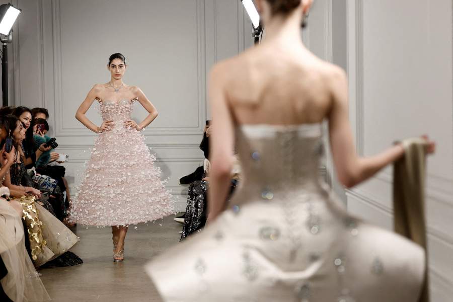 Models present creations by designers Phan Huy and Steven Doan as part of their Haute Couture Spring/Summer 2026 collection show for fashion house Phan Huy in Paris, France, January 29,