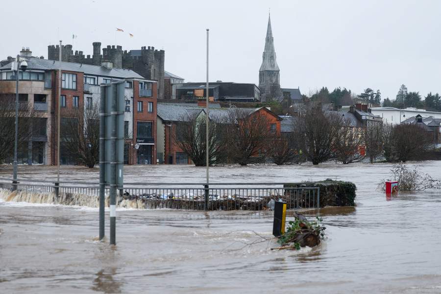 oodwater flows through a street, after the River Slaney burst its banks during Storm Chandra, in Enniscorthy, County Wexford, Ireland