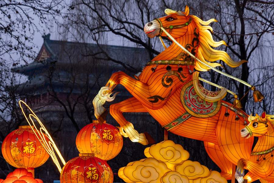A light installation depicting a Fire Horse appears next to Zhengyang Gate Tower ahead of the Lunar New Year, in Beijing, China