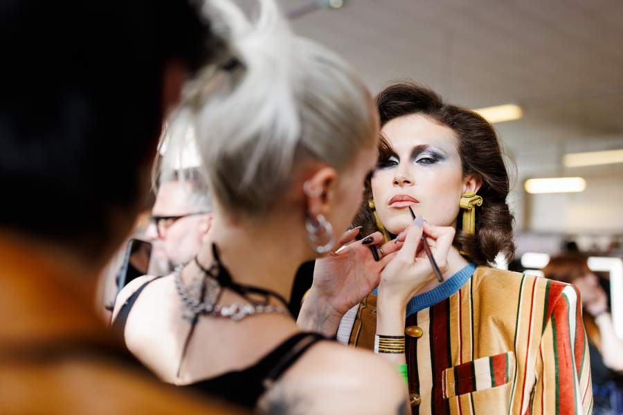 PARIS, FRANCE - MARCH 07: (EDITORIAL USE ONLY - For Non-Editorial use please seek approval from Fashion House) A model prepares backstage prior to the Vivienne Westwood Womenswear Fall/Winter 2026-2027 show at Césure as part of Paris Fashion Week on March 07, 2026 in Paris, France. (Photo by Richard Bord/Getty Images)