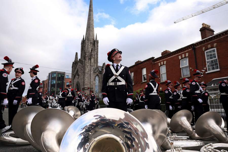 Members of Ohio State University Marching Band prepare for the St. Patrick's Day parade in Dublin, Ireland, March 17, 2026