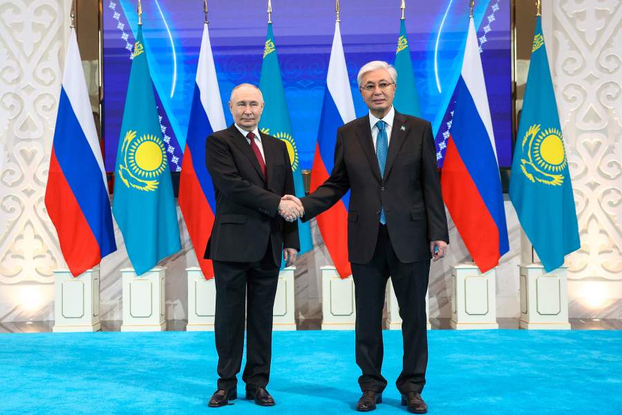 Russian President Vladimir Putin and Kazakh President Kassym-Jomart Tokayev pose for a picture before a meeting at the Palace of Independence in Astana, Kazakhstan May 28
