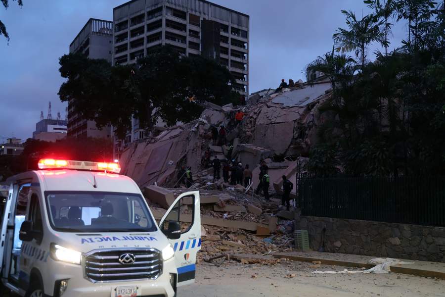 First responders attend a damaged building at Los Palos Grandes after a magnitude 7.2 earthquake struck Venezuela and other regions in the Caribbean on June 24, 2026 in Caracas, Venezuela. According to the U.S. Geological Survey (USGS), the main earthquake was followed by a 7.5-magnitude aftershock less than a minute later; although some buildings collapsed, the number of victims remains unknown