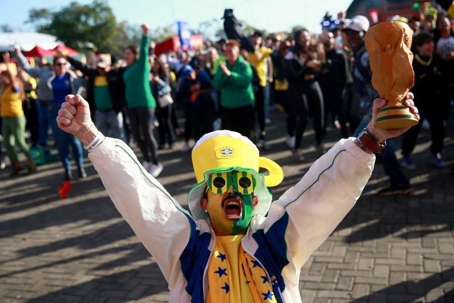 A Brazil fan celebrates during a FIFA World Cup Round of 32 match between Brazil and Japan, in Porto Alegre, Brazil, June 29, 2026. REUTERS/Diego Vara REFILE - CORRECTING LOCATION FROM "HOUSTON, TEXAS" TO "PORTO ALEGRE, BRAZIL\