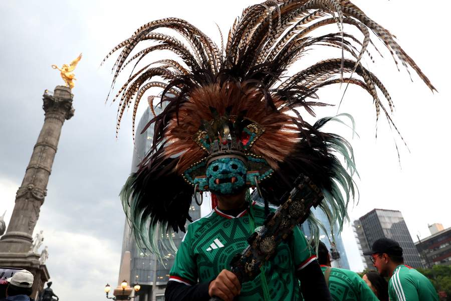 Soccer Football - FIFA World Cup 2026 - Round of 32 - Mexico v Ecuador - Fans gather in Mexico City - Mexico City, Mexico - June 30, 2026 A Mexico fan wears a headdress before the match REUTERS/Luis Cortes