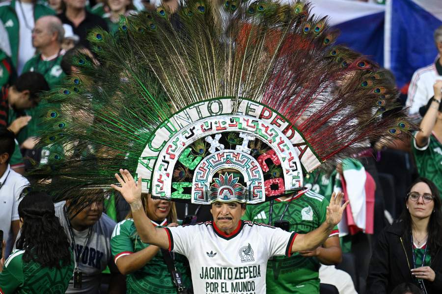 Soccer Football - FIFA World Cup 2026 - Group A - Czech Republic v Mexico - Estadio Azteca, Mexico City, Mexico - June 24, 2026 Mexico fan Jacinto Zepeda is seen wearing a feathered headdress inside the stadium before the match REUTERS/Annegret Hilse