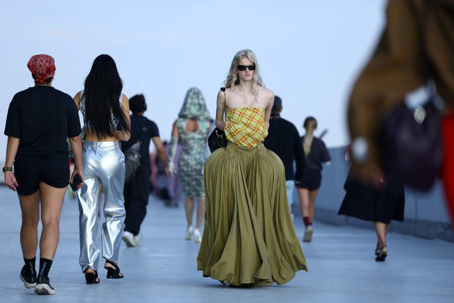 A model presents a creation from the Moschino Spring/Summer 2027 collection during Fashion Week in Milan, Italy, September 25, 2026